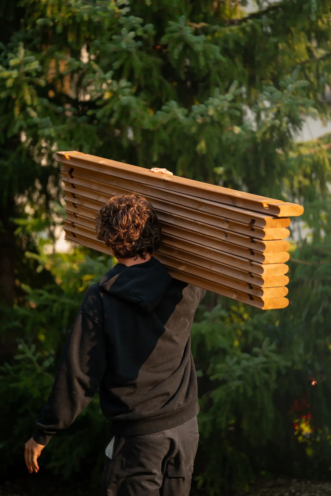 Western Sol team members working behind the scenes on sauna craftsmanship and quality control